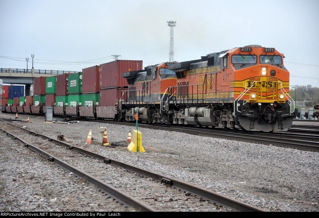 Stack train rolls east through University